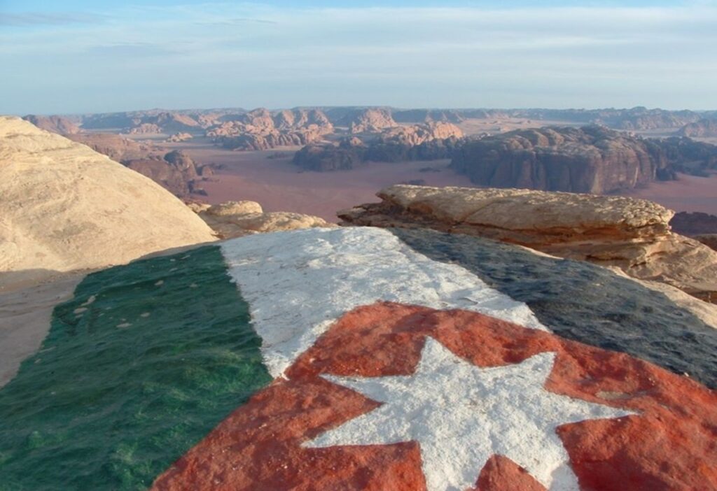 jordan-flag-made-with-flowers-on-top-of-a-mountain