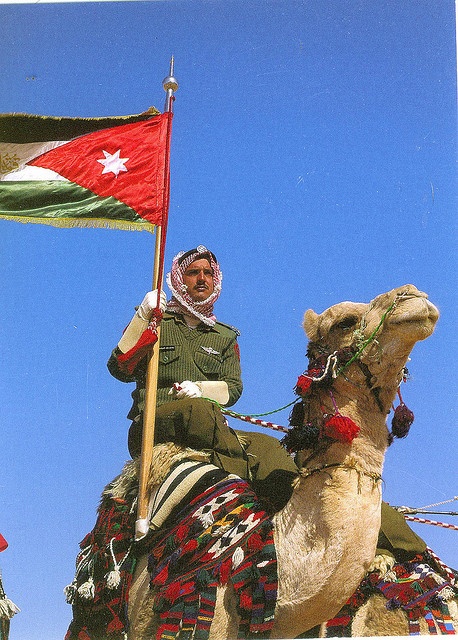 police-officer-camel-jordan-flag