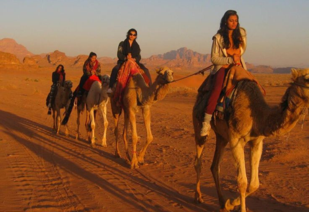 girls-enjoying-camel-riding-in-petra-and-wadi-rum-jordan