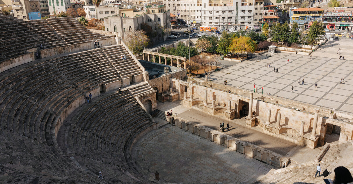 roman-amphitheater-amman-jordan-people-standing-tourists